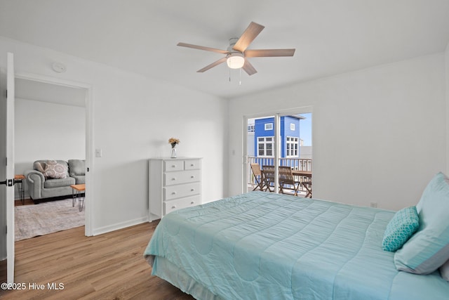 1503 Carolina Beach Ave N Unit 2A, Carolina Beach, NC 28428 - bedroom with wood finished floors, baseboards, and ceiling fan