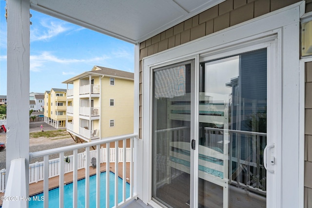 1503 Carolina Beach Ave N Unit 2A, Carolina Beach, NC 28428 - balcony featuring view of pool area