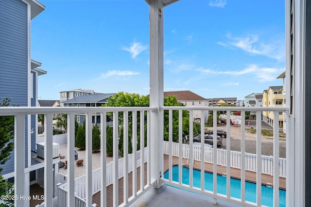 1503 Carolina Beach Ave N Unit 2A, Carolina Beach, NC 28428 - balcony with view of pool and a residential view