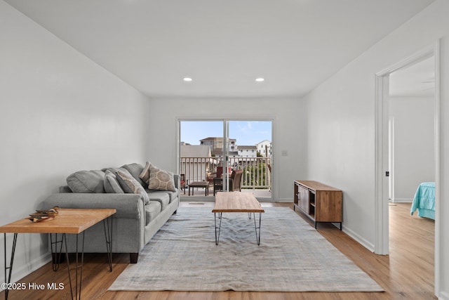 1503 Carolina Beach Ave N Unit 2A, Carolina Beach, NC 28428 - living room featuring wood finished floors, recessed lighting, and baseboards