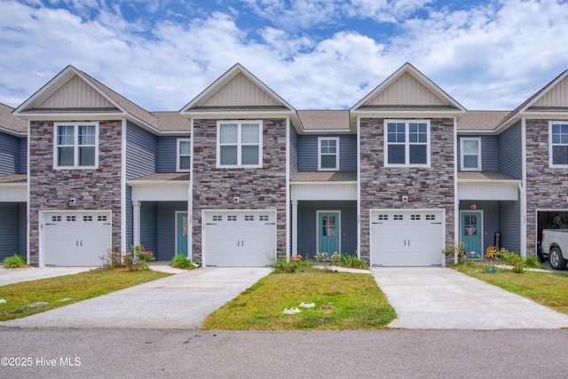 329 S Stingray Ln, Sneads Ferry, NC 28460 - townhome / multi-family property with stone siding and board and batten siding