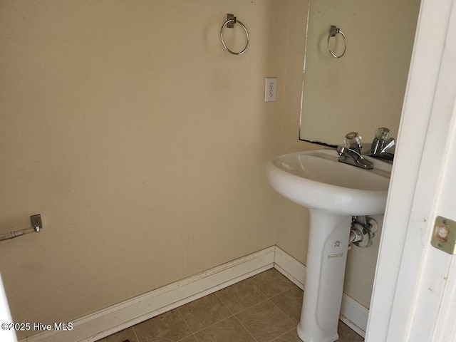 5702 Whichard Rd, Stokes, NC 27884 - bathroom featuring baseboards and tile patterned floors
