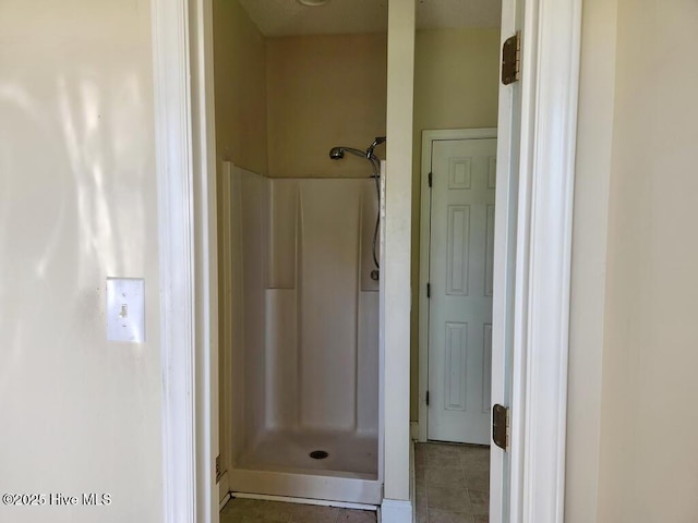 5702 Whichard Rd, Stokes, NC 27884 - bathroom featuring a shower stall and tile patterned floors