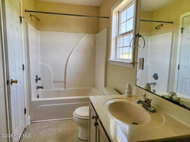 5702 Whichard Rd, Stokes, NC 27884 - bathroom with toilet,  shower combination, vanity, and tile patterned flooring