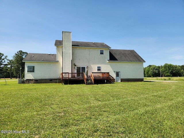 5702 Whichard Rd, Stokes, NC 27884 - rear view of house with crawl space, a deck, a lawn, and a chimney