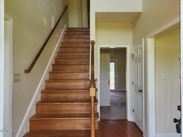 5702 Whichard Rd, Stokes, NC 27884 - staircase featuring hardwood / wood-style flooring and baseboards