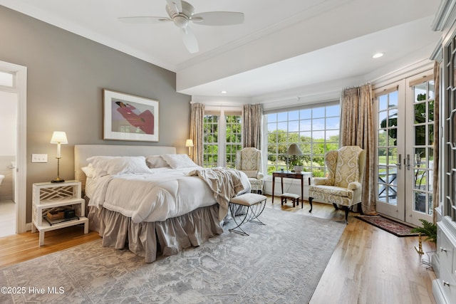 8300 Fazio Dr, Wilmington, NC 28411 - bedroom with access to exterior, wood finished floors, ornamental molding, french doors, and recessed lighting