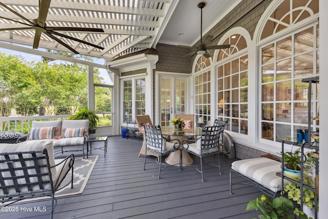 8300 Fazio Dr, Wilmington, NC 28411 - deck featuring outdoor lounge area, outdoor dining area, ceiling fan, and a pergola
