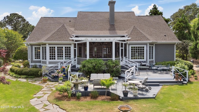 8300 Fazio Dr, Wilmington, NC 28411 - rear view of property with a wooden deck, a pergola, a yard, an outdoor hangout area, and roof with shingles