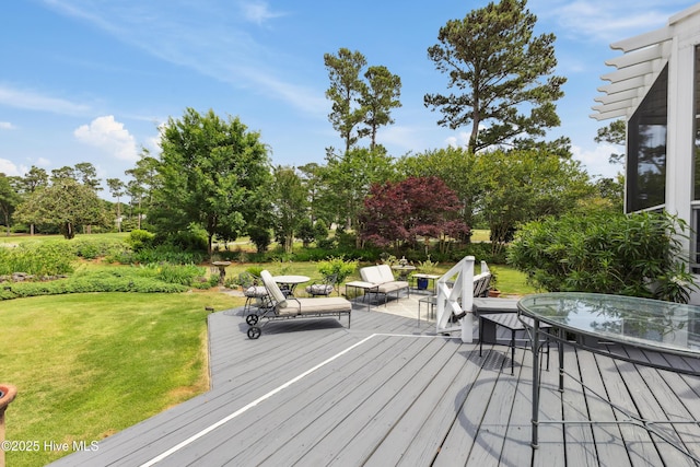 8300 Fazio Dr, Wilmington, NC 28411 - wooden deck with a lawn and view of scattered trees