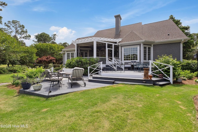 8300 Fazio Dr, Wilmington, NC 28411 - back of house featuring a pergola, a deck, a yard, and an outdoor living space
