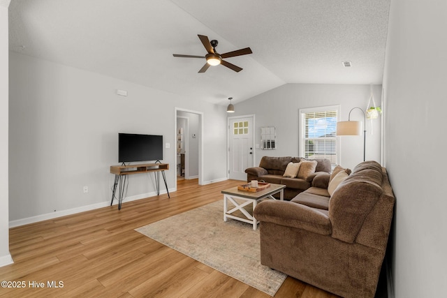 7321 Haskell Ct, Wilmington, NC 28411 - living area featuring ceiling fan, light wood finished floors, lofted ceiling, and baseboards