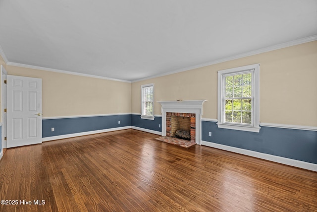 1510 Lucerne Way, New Bern, NC 28560 - unfurnished living room with wood finished floors, a brick fireplace, baseboards, and ornamental molding