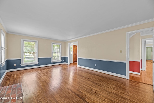 1510 Lucerne Way, New Bern, NC 28560 - unfurnished living room featuring wood finished floors, crown molding, and baseboards