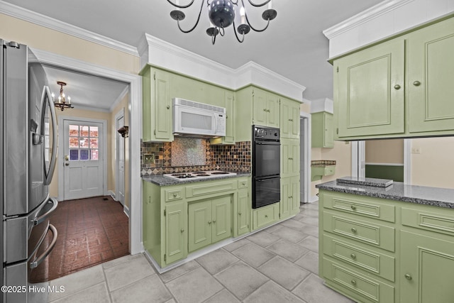 1510 Lucerne Way, New Bern, NC 28560 - kitchen with a chandelier, green cabinets, white appliances, ornamental molding, and backsplash