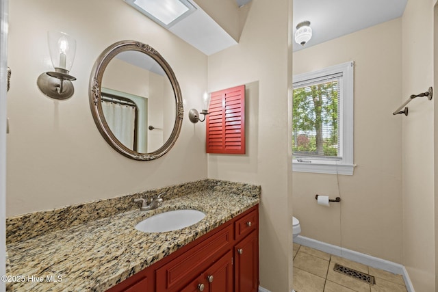 1510 Lucerne Way, New Bern, NC 28560 - bathroom with toilet, vanity, tile patterned flooring, and baseboards