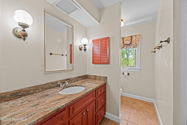 1510 Lucerne Way, New Bern, NC 28560 - bathroom with vanity, toilet, baseboards, and tile patterned floors