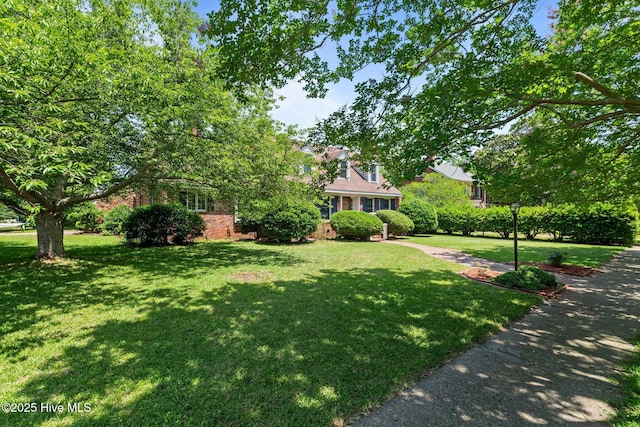 1510 Lucerne Way, New Bern, NC 28560 - view of front of home featuring a front lawn and brick siding
