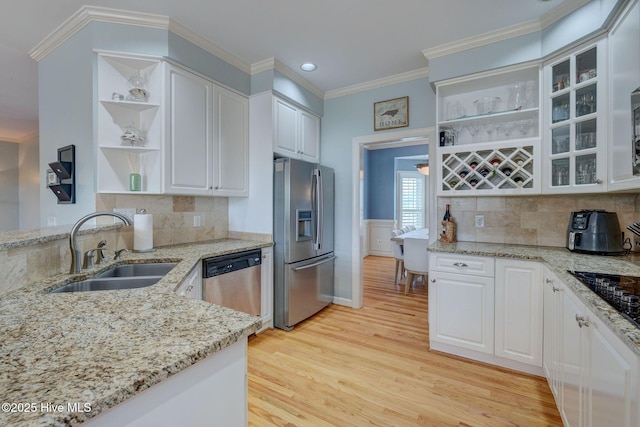 809 Berwyn Rd, Wilmington, NC 28409 - kitchen with appliances with stainless steel finishes, a sink, open shelves, light wood-style flooring, and crown molding