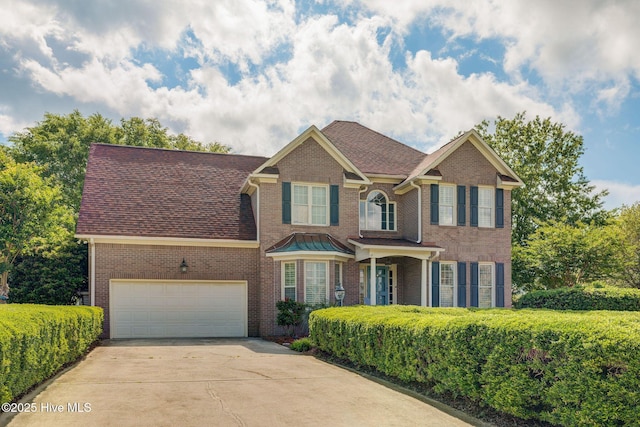 809 Berwyn Rd, Wilmington, NC 28409 - view of front of property with driveway, brick siding, and a garage