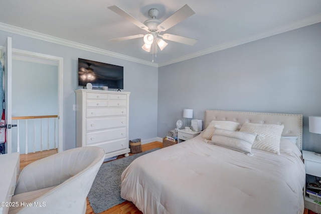 809 Berwyn Rd, Wilmington, NC 28409 - bedroom featuring ornamental molding, wood finished floors, baseboards, and ceiling fan