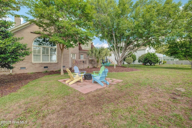 809 Berwyn Rd, Wilmington, NC 28409 - view of green lawn featuring a fire pit and a patio