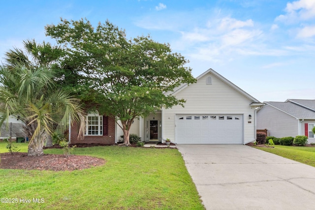 1434 Wagon Ct, Wilmington, NC 28412 - view of front of house featuring an attached garage, concrete driveway, a front yard, and brick siding