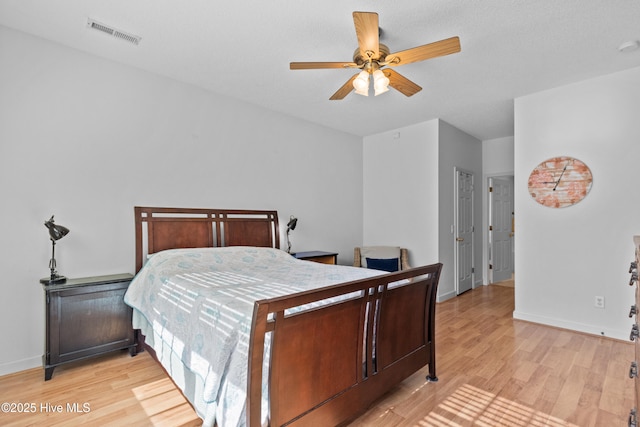 1434 Wagon Ct, Wilmington, NC 28412 - bedroom with light wood finished floors, baseboards, and ceiling fan
