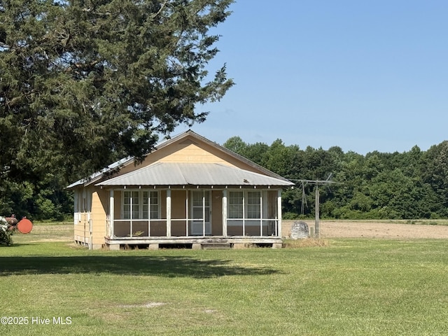 718 Beasley Rd, Roper, NC 27970 - view of front of house featuring a front yard and a view of trees