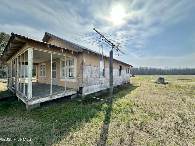 718 Beasley Rd, Roper, NC 27970 - view of home's exterior featuring a deck and a yard