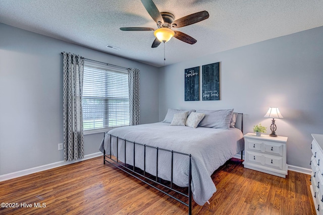443 Foxfield Ct, Wilmington, NC 28411 - bedroom featuring baseboards, wood finished floors, a textured ceiling, and a ceiling fan