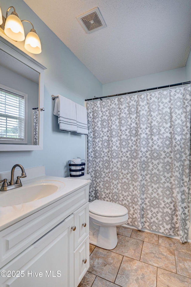 443 Foxfield Ct, Wilmington, NC 28411 - full bath with vanity, toilet, and stone finish flooring