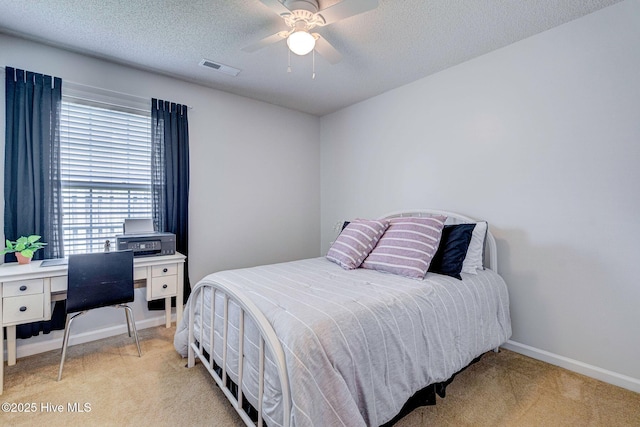 443 Foxfield Ct, Wilmington, NC 28411 - bedroom featuring light carpet, baseboards, a textured ceiling, and ceiling fan