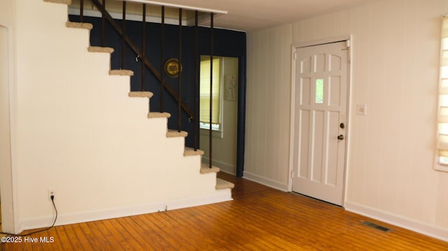 1817 Asheville St, New Bern, NC 28560 - foyer entrance with stairs, baseboards, and wood finished floors