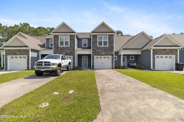 210 N Stingray Ln, Sneads Ferry, NC 28460 - craftsman-style home with stone siding, board and batten siding, and a front yard