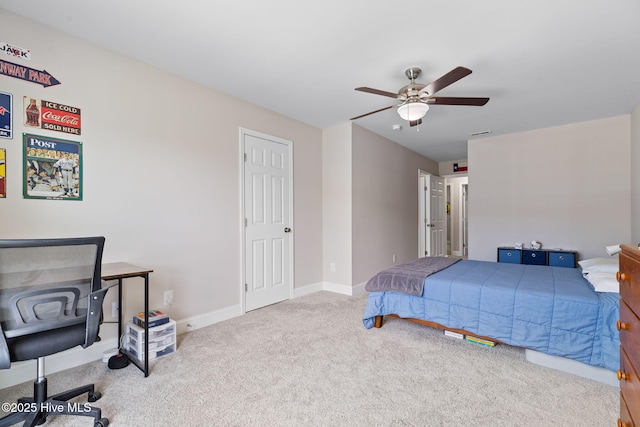 210 N Stingray Ln, Sneads Ferry, NC 28460 - bedroom featuring carpet flooring, baseboards, and a ceiling fan