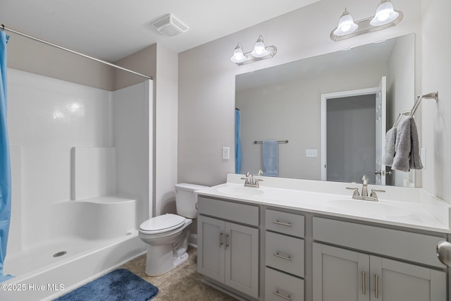 210 N Stingray Ln, Sneads Ferry, NC 28460 - bathroom with double vanity, toilet, a shower, and tile patterned floors