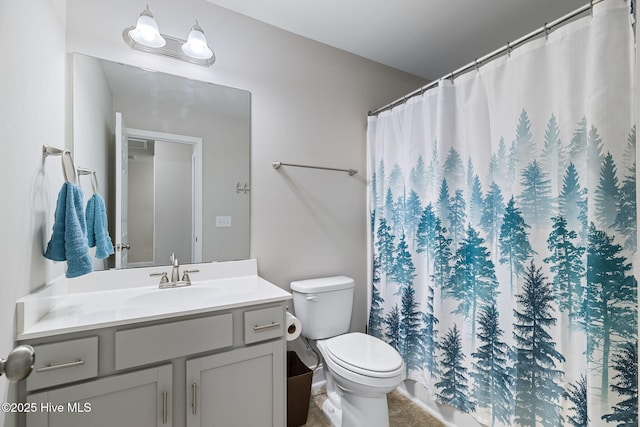 210 N Stingray Ln, Sneads Ferry, NC 28460 - full bathroom featuring vanity, toilet, and a shower with shower curtain