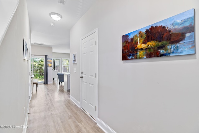 210 N Stingray Ln, Sneads Ferry, NC 28460 - hall featuring light wood finished floors and baseboards