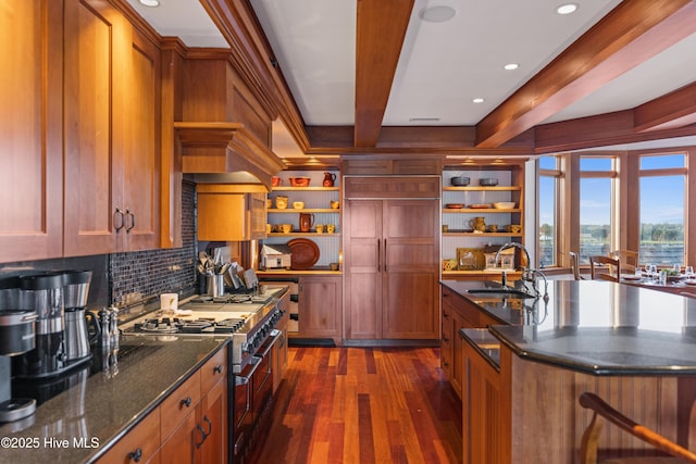 218 Row Boat Row, Bald Head Island, NC 28461 - kitchen with open shelves, double oven range, beam ceiling, a sink, and dark wood-style flooring