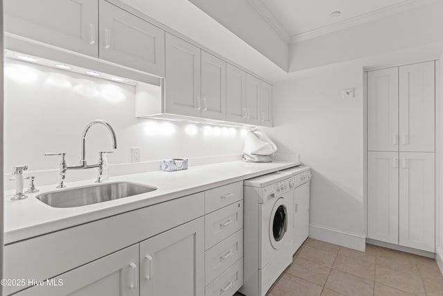 218 Row Boat Row, Bald Head Island, NC 28461 - laundry room with cabinet space, ornamental molding, separate washer and dryer, light tile patterned floors, and baseboards