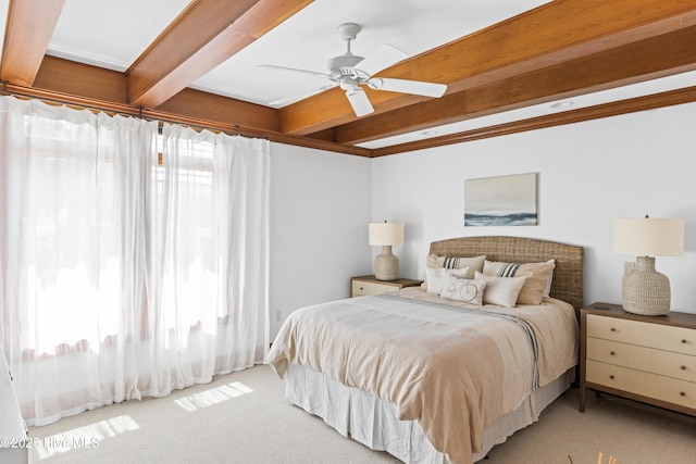 218 Row Boat Row, Bald Head Island, NC 28461 - bedroom featuring beamed ceiling, carpet flooring, and a ceiling fan