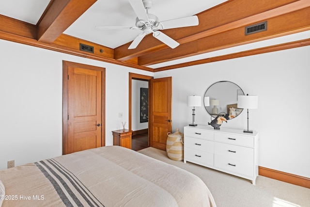218 Row Boat Row, Bald Head Island, NC 28461 - bedroom featuring beamed ceiling, light carpet, baseboards, and a ceiling fan