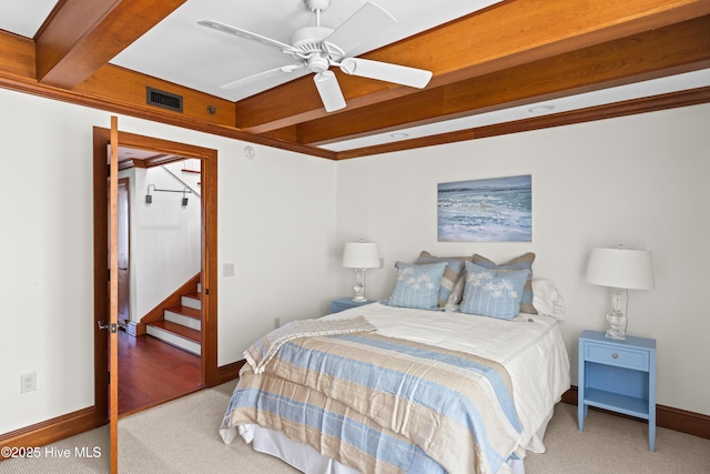 218 Row Boat Row, Bald Head Island, NC 28461 - bedroom featuring carpet flooring, beamed ceiling, baseboards, and ceiling fan