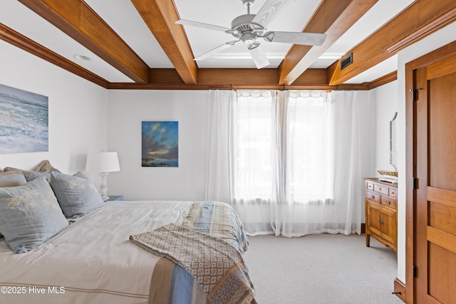 218 Row Boat Row, Bald Head Island, NC 28461 - bedroom with beamed ceiling, carpet flooring, and a ceiling fan