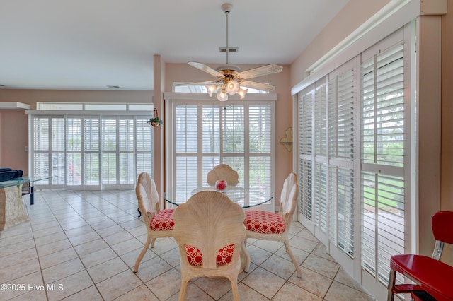 7120 Orchard Trce, Wilmington, NC 28409 - dining area with light tile patterned flooring, a ceiling fan, and healthy amount of natural light
