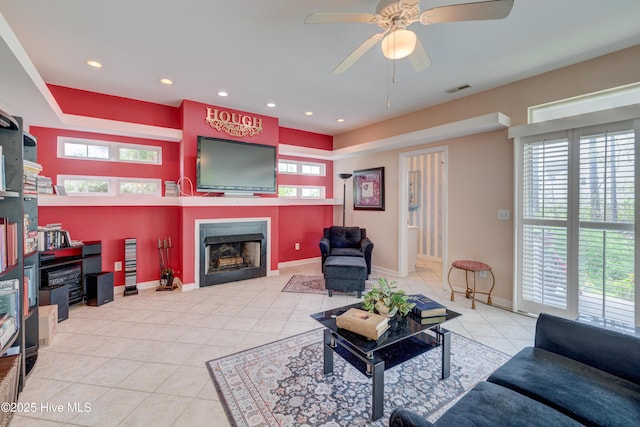 7120 Orchard Trce, Wilmington, NC 28409 - living area featuring tile patterned floors, a fireplace, recessed lighting, healthy amount of natural light, and a ceiling fan