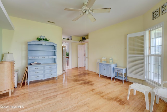 7120 Orchard Trce, Wilmington, NC 28409 - living area with healthy amount of natural light, light wood finished floors, and a ceiling fan