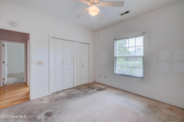 7120 Orchard Trce, Wilmington, NC 28409 - unfurnished bedroom featuring carpet, a closet, baseboards, and ceiling fan