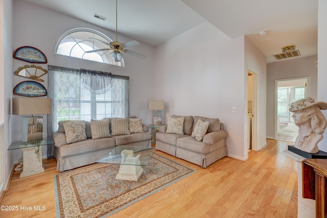 7120 Orchard Trce, Wilmington, NC 28409 - living area with wood finished floors, ceiling fan, and baseboards